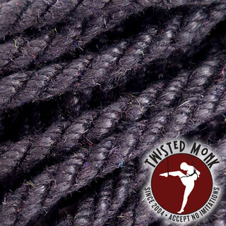 Close-up of black hemp bondage rope by The Twisted Monk showcasing its texture and durability