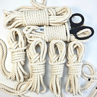 The Twisted Monk cotton bondage rope kit featuring multiple lengths of soft cotton rope and safety scissors