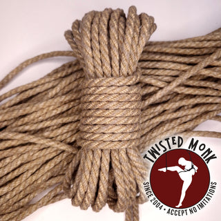 Natural hemp bondage rope by The Twisted Monk, ideal for secure and comfortable restraint.