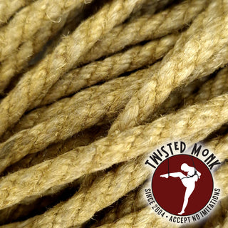 Natural hemp bondage rope from The Twisted Monk with a sturdy, braided texture for secure use