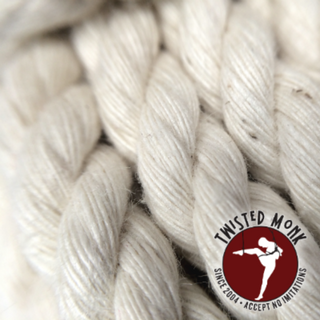 Close-up of white cotton bondage rope by The Twisted Monk, showcasing its softness and texture