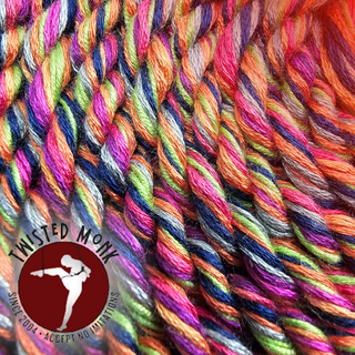 Vibrant collection of bespoke bondage rope showcasing colorful twisted strands for various uses