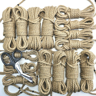 Natural hemp bondage rope kit by The Twisted Monk with multiple lengths and a pair of scissors