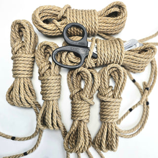 Complete bondage rope kit by The Twisted Monk with multiple ropes and safety scissors for secure use