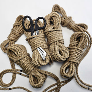 The Twisted Monk bondage rope kit featuring multiple strands of high-quality, durable ropes and safety scissors.