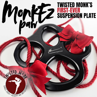 MonkEz Paw suspension plate by Twisted Monk with red bows and black design for versatile hanging solutions