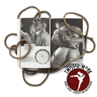 Open bondage guide book by The Twisted Monk with engaging photography and instructional content
