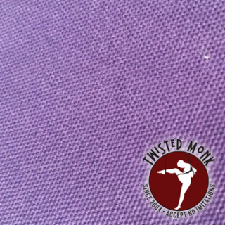 Close-up of purple fabric featuring The Twisted Monk logo and MonkSak Pak storage solution