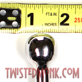 Z-Hook bondage accessory by William C. Steel with a shiny finish and measuring tape for size reference